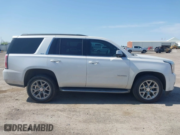 2017 GMC Yukon SLT z VIN 1GKS1BKC2HR378437, wystawiony jako IAAI lot #41923260 z przebiegiem 127 356 mil mil oraz . Historia ofert i sprzedaży dostępna na DreamBid. Obrazek 13.