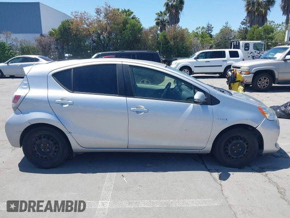 2014 Toyota Prius One with VIN JTDKDTB38E1061202, listed as a IAAI auction lot 42044747 with 133,409 mi miles and . Bid and sale history available at DreamBid. Image 13.
