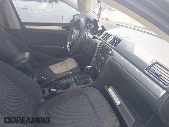 2016 Volkswagen Passat S with VIN 1VWAT7A30GC058676, listed as a IAAI auction lot 39978574 with Not provided miles and . Bid and sale history available at DreamBid. Image 5.
