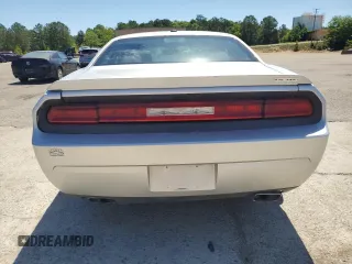 2012 Dodge Challenger R/T z VIN 2C3CDYBT0CH259731, wystawiony jako Copart lot #58033035 z przebiegiem 142 427 mil mil oraz Czysty tytuł • Clean title. Historia ofert i sprzedaży dostępna na DreamBid. Obrazek 6.