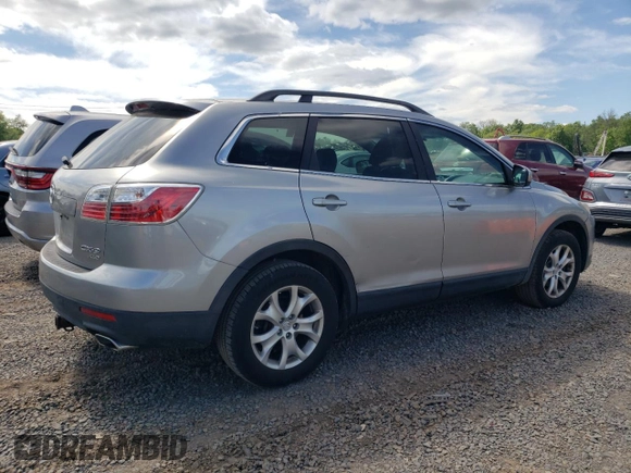 2011 Mazda CX-9 Touring z VIN JM3TB3CV3B0323789, wystawiony jako Copart lot #57762505 z przebiegiem 151 942 mil mil oraz Czysty tytuł • Clean title. Historia ofert i sprzedaży dostępna na DreamBid. Obrazek 3.