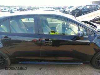 2021 Toyota Corolla LE with VIN JTDEPMAE5MJ126390, listed as a IAAI auction lot 41669331 with 77,398 mi miles. Bid and sale history available at carsss.com. Image 13.