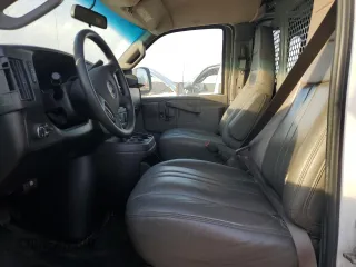 2019 Chevrolet Express Cargo with VIN 1GCWGAFP9K1175974, listed as a Copart auction lot 76817054 with 84,623 mi miles and Salvage title. Bid and sale history available at DreamBid. Image 7.