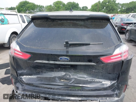 2020 Ford Edge Titanium z VIN 2FMPK3K92LBB24713, wystawiony jako IAAI lot #41949412 z przebiegiem 97 014 mil mil oraz . Historia ofert i sprzedaży dostępna na DreamBid. Obrazek 16.