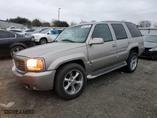 2000 Cadillac Escalade with VIN 1GYEK63R5YR219759, listed as a Copart auction lot 86373734 with 190,307 mi miles and Salvage Title. Bid and sale history available at carsss.com. Image 1.