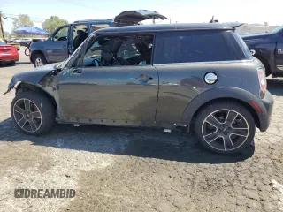 2012 MINI Hardtop S with VIN WMWSV3C53CTY29714, listed as a Copart auction lot 52370175 with 94,536 mi miles and Salvage title. Bid and sale history available at DreamBid. Image 2.