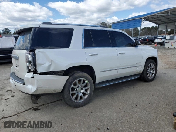 2016 GMC Yukon Denali with VIN 1GKS1CKJ4GR180185, listed as a Copart auction lot 47815835 with 197,506 mi miles and Salvage Title. Bid and sale history available at DreamBid. Image 3.