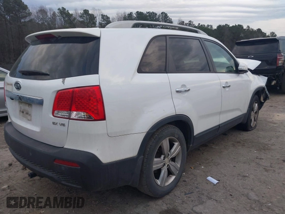 2012 Kia Sorento EX with VIN 5XYKU4A23CG303020, listed as a IAAI auction lot 41453881 with 242,131 mi miles. Bid and sale history available at carsss.com. Image 4.