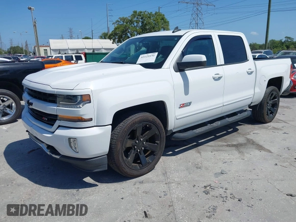 2017 Chevrolet Silverado 1500 LT with VIN 3GCUKREC4HG391101, listed as a IAAI auction lot 42129151 with 84,670 mi miles and . Bid and sale history available at DreamBid. Image 2.