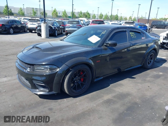 2019 Dodge Charger SRT Hellcat z VIN 2C3CDXL91KH749445, wystawiony jako IAAI lot #42300340 z przebiegiem 68 224 mil mil oraz . Historia ofert i sprzedaży dostępna na DreamBid. Obrazek 22.