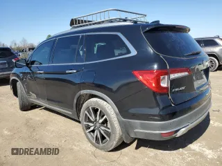 2019 Honda Pilot Touring 7-Passenger z VIN 5FNYF5H69KB019903, wystawiony jako Copart lot #43598805 z przebiegiem 144 486 mil mil oraz Szkoda całkowita • Salvage title. Historia ofert i sprzedaży dostępna na DreamBid. Obrazek 2.