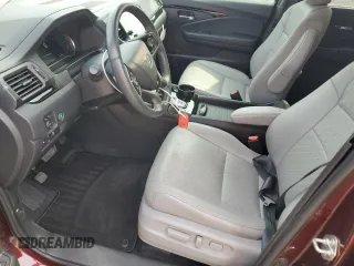 2019 Honda Passport Touring with VIN 5FNYF8H9XKB026631, listed as a Copart auction lot 61037545 with 54,041 mi miles and Salvage title. Bid and sale history available at DreamBid. Image 7.