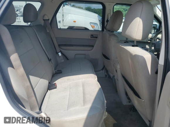 2012 Ford Escape XLT with VIN 1FMCU9D73CKC29497, listed as a Copart auction lot 63211965 with 142,134 mi miles and Salvage title. Bid and sale history available at DreamBid. Image 11.