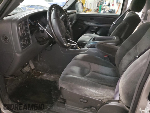 2004 Chevrolet Silverado 1500 with VIN 1GCEK19T24Z307903, listed as a Copart auction lot 49138965 with 165,162 mi miles and Salvage Title. Bid and sale history available at DreamBid. Image 7.