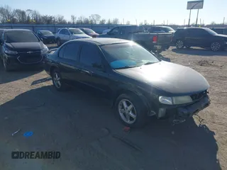 1997 Nissan Maxima GXE z VIN JN1CA21D0VT866037, wystawiony jako IAAI lot #41680234 z przebiegiem 216 066 mil mil oraz . Historia ofert i sprzedaży dostępna na DreamBid. Obrazek 1.