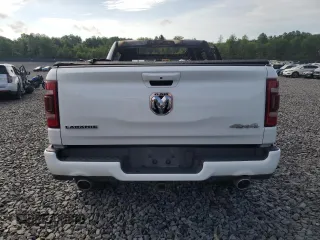 2020 Ram 1500 Laramie with VIN 1C6SRFJM9LN213594, listed as a Copart auction lot 61912715 with Not provided miles and Salvage title. Bid and sale history available at DreamBid. Image 6.
