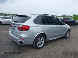 2018 BMW X5 xDrive35i z VIN 5UXKR0C5XJ0Y00343, wystawiony jako IAAI lot #42368337 z przebiegiem 52 101 mil mil oraz . Historia ofert i sprzedaży dostępna na DreamBid. Obrazek 4.