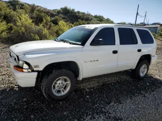 1999 Dodge Durango z VIN 1B4HS28Z6XF649205, wystawiony jako Copart lot #57683305 z przebiegiem 111 561 mil mil oraz Szkoda całkowita • Salvage title. Historia ofert i sprzedaży dostępna na DreamBid. Obrazek 1.