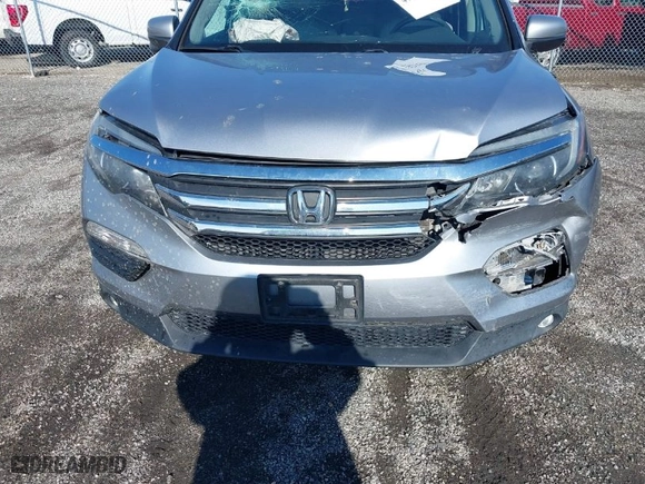 2016 Honda Pilot EX-L with VIN 5FNYF6H50GB092999, listed as a IAAI auction lot 41462504 with 141,604 mi miles. Bid and sale history available at carsss.com. Image 12.