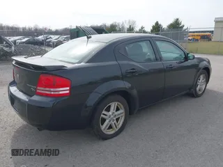 2009 Dodge Avenger SXT with VIN 1B3LC56B49N570157, listed as a IAAI auction lot 41796122 with 164,571 mi miles. Bid and sale history available at carsss.com. Image 4.