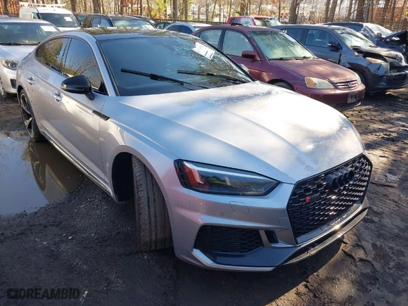 2019 Audi RS 5 Sportback with VIN WUABWCF50KA903597, listed as a IAAI auction lot 41574876 with 80,629 mi miles. Bid and sale history available at carsss.com. Image 1.