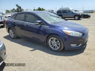 2016 Ford Focus Titanium z VIN 1FADP3J2XGL319399, wystawiony jako Copart lot #59258745 z przebiegiem 215 296 mil mil oraz Szkoda całkowita • Salvage title. Historia ofert i sprzedaży dostępna na DreamBid. Obrazek 4.
