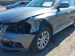 2016 Audi Q5 Premium Plus z VIN WA1L2AFP5GA140352, wystawiony jako IAAI lot #42605558 z przebiegiem 106 185 mil mil oraz . Historia ofert i sprzedaży dostępna na DreamBid. Obrazek 6.