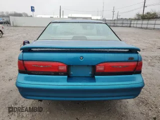 1994 Ford Thunderbird LX with VIN 1FALP6243RH223519, listed as a Copart auction lot 80962814 with 125,016 mi miles and Salvage Title. Bid and sale history available at DreamBid. Image 6.