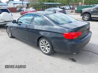 2011 BMW 3 Series 328i xDrive with VIN WBAKF5C55BE586564, listed as a IAAI auction lot 41944192 with 153,167 mi miles. Bid and sale history available at carsss.com. Image 3.