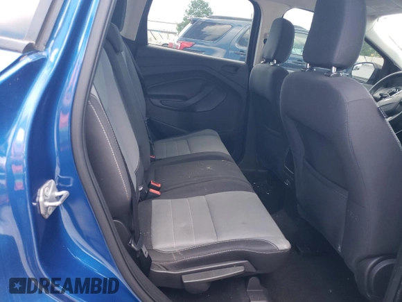 2018 Ford Escape S z VIN 1FMCU0F76JUC55683, wystawiony jako Copart lot #57614815 z przebiegiem 70 557 mil mil oraz Szkoda całkowita • Salvage title. Historia ofert i sprzedaży dostępna na DreamBid. Obrazek 10.