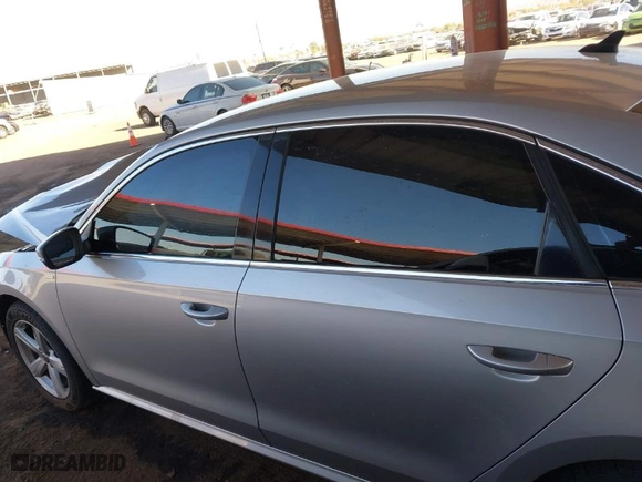 2014 Volkswagen Passat Wolfsburg Ed with VIN 1VWAT7A38EC051892, listed as a IAAI auction lot 41523058 with 122,493 mi miles. Bid and sale history available at carsss.com. Image 15.