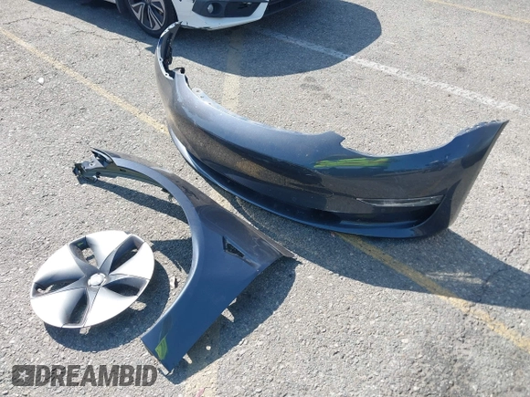 2018 Tesla Model 3 Long Range Battery z VIN 5YJ3E1EA2JF039262, wystawiony jako IAAI lot #42463443 z przebiegiem 77 482 mil mil oraz . Historia ofert i sprzedaży dostępna na DreamBid. Obrazek 12.