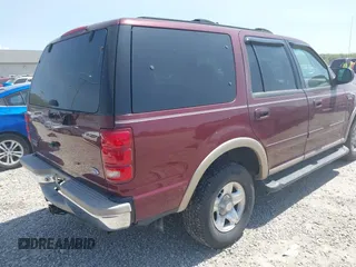 1998 Ford Expedition XLT z VIN 1FMRU17L9WLC23691, wystawiony jako IAAI lot #42107464 z przebiegiem 311 300 mil mil oraz . Historia ofert i sprzedaży dostępna na DreamBid. Obrazek 4.