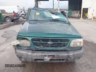 1999 Ford Explorer z VIN 1FMZU24E7XUA94325, wystawiony jako IAAI lot #41440741 z przebiegiem 99 926 mil mil oraz . Historia ofert i sprzedaży dostępna na DreamBid. Obrazek 12.