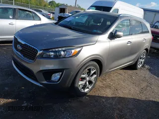 2016 Kia Sorento SX with VIN 5XYPKDA51GG031823, listed as a IAAI auction lot 42142495 with 87,132 mi miles. Bid and sale history available at carsss.com. Image 17.
