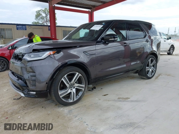 2023 Land Rover Discovery Metropolitan Edition with VIN SALRW4EU9P2467157, listed as a IAAI auction lot 41203156 with 32,071 mi miles. Bid and sale history available at carsss.com. Image 2.