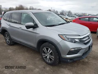 2017 Honda Pilot EX-L with VIN 5FNYF6H5XHB014067, listed as a IAAI auction lot 42083742 with 143,043 mi miles and . Bid and sale history available at DreamBid. Image 1.