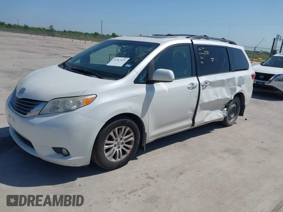 2015 Toyota Sienna XLE with VIN 5TDYK3DCXFS663083, listed as a IAAI auction lot 41967621 with 177,472 mi miles and . Bid and sale history available at DreamBid. Image 17.