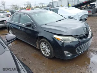 2014 Toyota Avalon Limited with VIN 4T1BK1EB5EU097999, listed as a IAAI auction lot 41908595 with 176,156 mi miles. Bid and sale history available at carsss.com. Image 1.