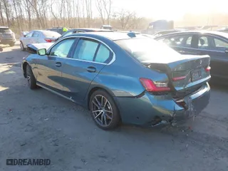 2021 BMW 3 Series 330i xDrive with VIN 3MW5R7J0XM8C18605, listed as a IAAI auction lot 41247002 with 73,828 mi miles. Bid and sale history available at carsss.com. Image 3.
