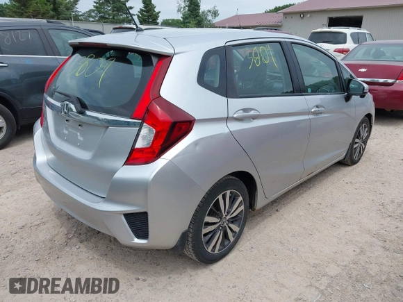 2015 Honda Fit EX-L z VIN 3HGGK5H8XFM730425, wystawiony jako IAAI lot #42503809 z przebiegiem 105 469 mil mil oraz . Historia ofert i sprzedaży dostępna na DreamBid. Obrazek 4.
