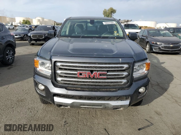 2015 GMC Canyon 4WD SLE with VIN 1GTG6BE31F1221315, listed as a Copart auction lot 78237394 with 93,411 mi miles and Salvage Title. Bid and sale history available at carsss.com. Image 5.