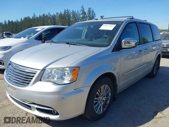 2011 Chrysler Town & Country Limited with VIN 2A4RR6DG4BR667311, listed as a IAAI auction lot 42057487 with 93,628 mi miles. Bid and sale history available at carsss.com. Image 2.