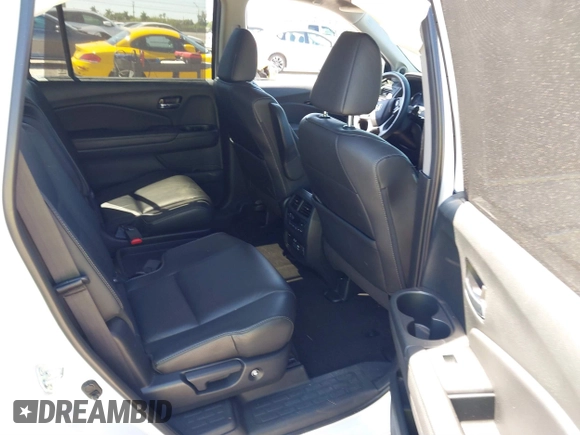 2022 Honda Pilot Touring 7-Passenger с VIN 5FNYF5H66NB034248, выставлен на аукционе IAAI как лот 41777362 с пробегом 26 611 миль миль и . История ставок и продаж доступна на DreamBid. Изображение 8.