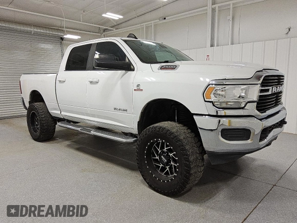 2021 Ram 2500 Big Horn z VIN 3C6UR5DL7MG542214, wystawiony jako Copart lot #52359235 z przebiegiem 119 483 mil mil oraz Tytuł czysty. Historia ofert i sprzedaży dostępna na DreamBid. Obrazek 4.