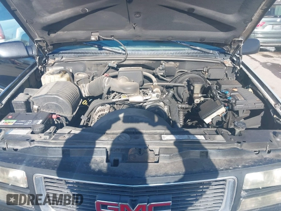 1997 GMC Yukon with VIN 1GKEK13R3VJ759103, listed as a IAAI auction lot 41726127 with 218,500 mi miles. Bid and sale history available at carsss.com. Image 10.