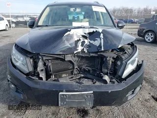 2012 Volkswagen Tiguan SE with VIN WVGAV7AX3CW531264, listed as a IAAI auction lot 41651242 with 190,669 mi miles and . Bid and sale history available at DreamBid. Image 6.