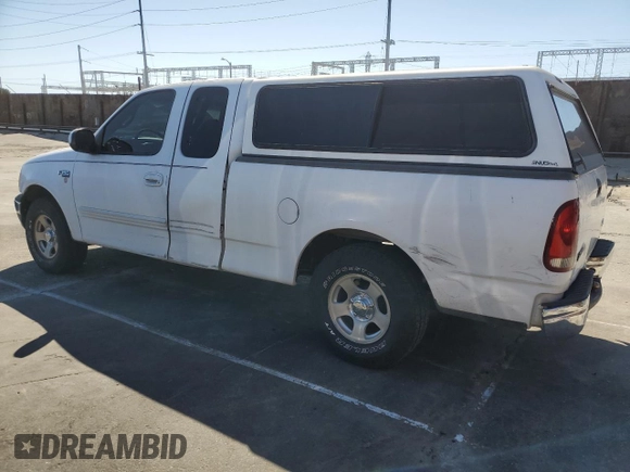 2000 Ford F-150 XL with VIN 1FTZX172XYNC01869, listed as a Copart auction lot 47414095 with 0 mi miles and Salvage Title. Bid and sale history available at carsss.com. Image 2.