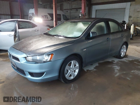 2008 Mitsubishi Lancer DE with VIN JA3AU26U08U034294, listed as a IAAI auction lot 42158892 with 50,467 mi miles. Bid and sale history available at carsss.com. Image 2.