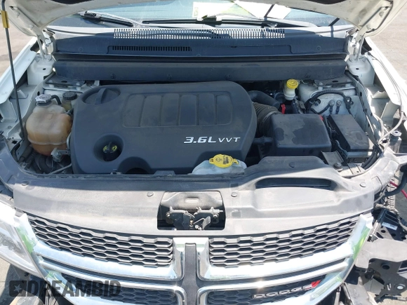 2013 Dodge Journey SXT with VIN 3C4PDCBG4DT696966, listed as a IAAI auction lot 42555632 with 144,927 mi miles and . Bid and sale history available at DreamBid. Image 10.